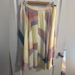 Lulu’s chiffon-like midi skirt with colorful geometric design!